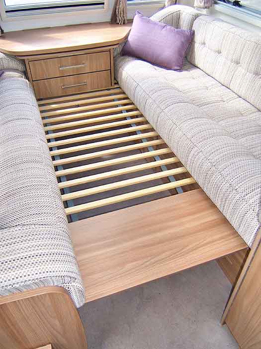 This array of wooden slats pulls out from under the drawer cabinet. It helps make the conversion of the front lounge area into a sleeping area that bit more easier and convenient.